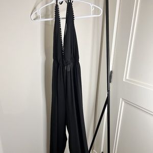 BLACK HALTER FIT AND FLARE JUMPSUIT